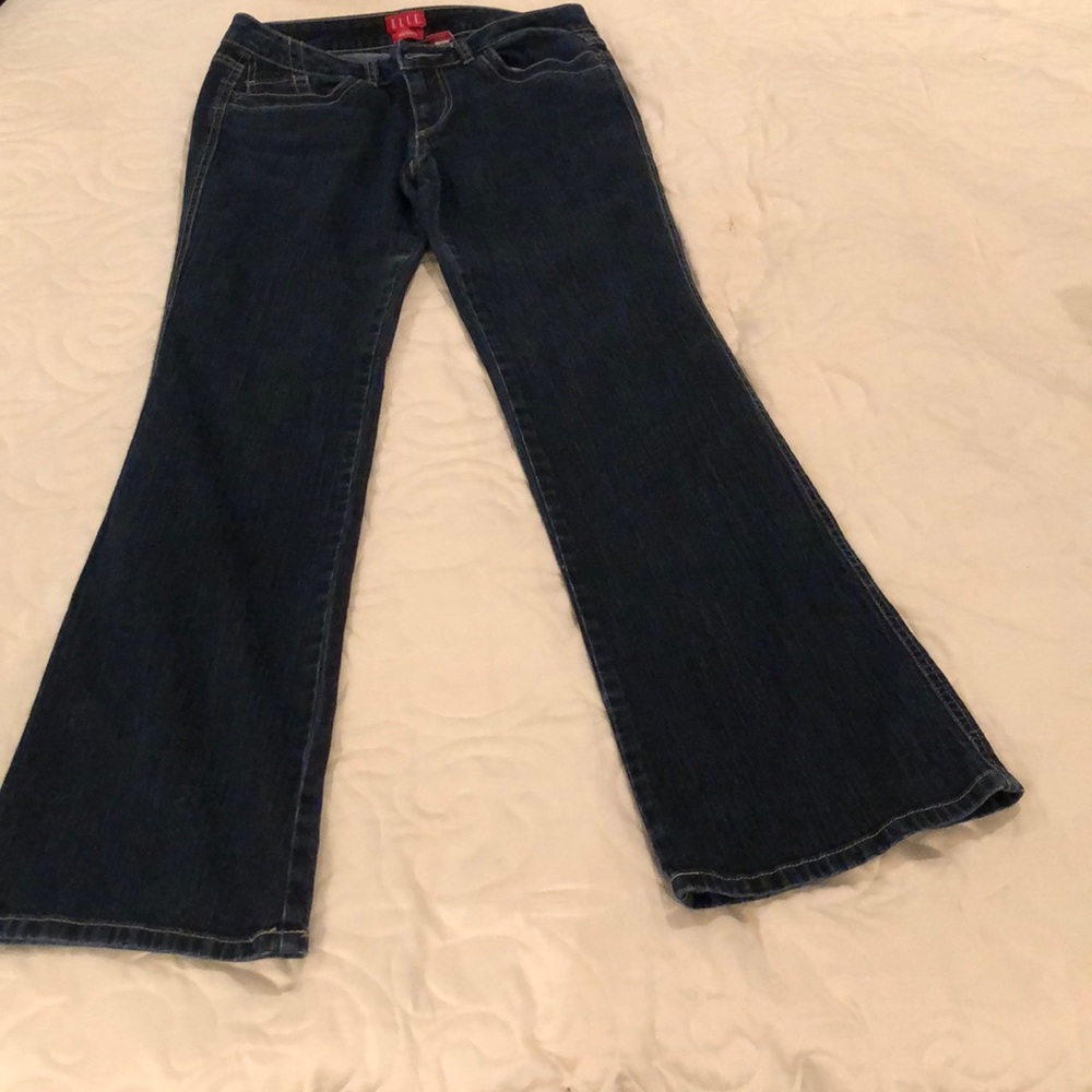Elle Monaco loose fit flared jeans.